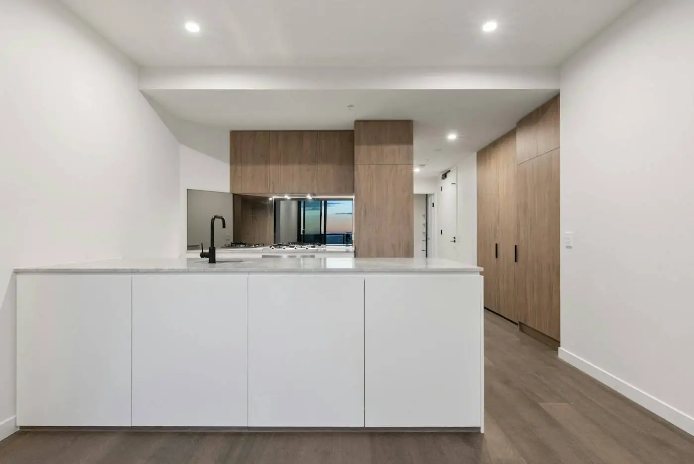 White and timber custom kitchen